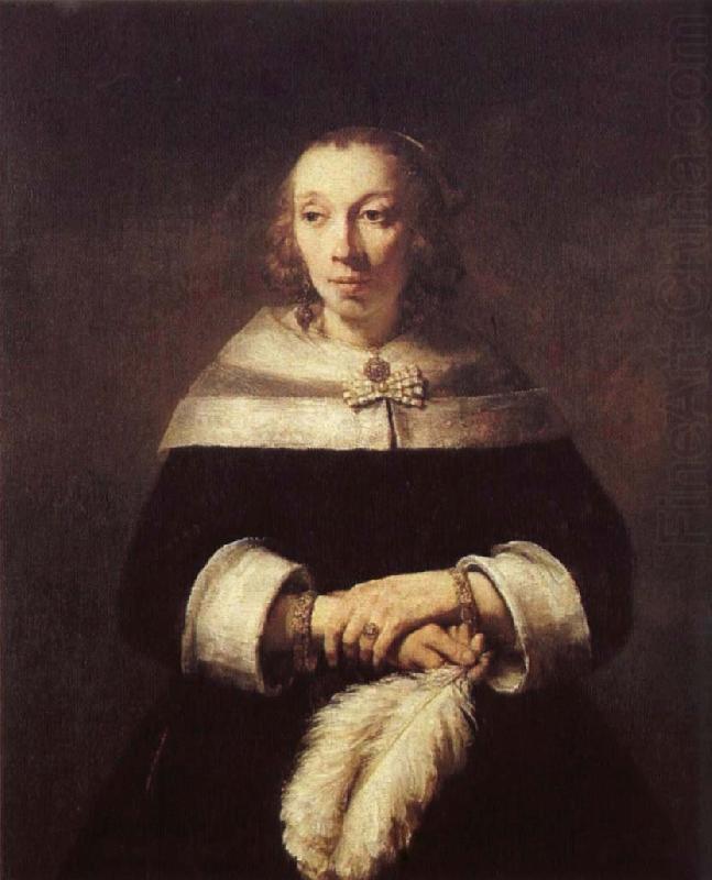 A woman with solfjader of a strutsplym, Rembrandt Harmensz Van Rijn